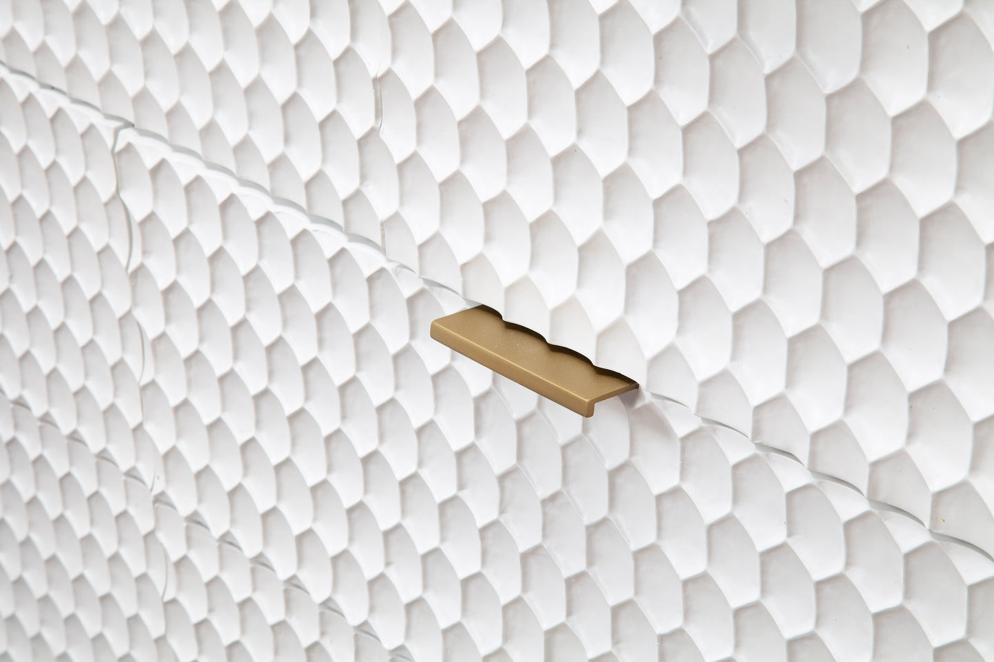 Close-up of sculpted honeycomb texture on Cotton Candy white dresser 